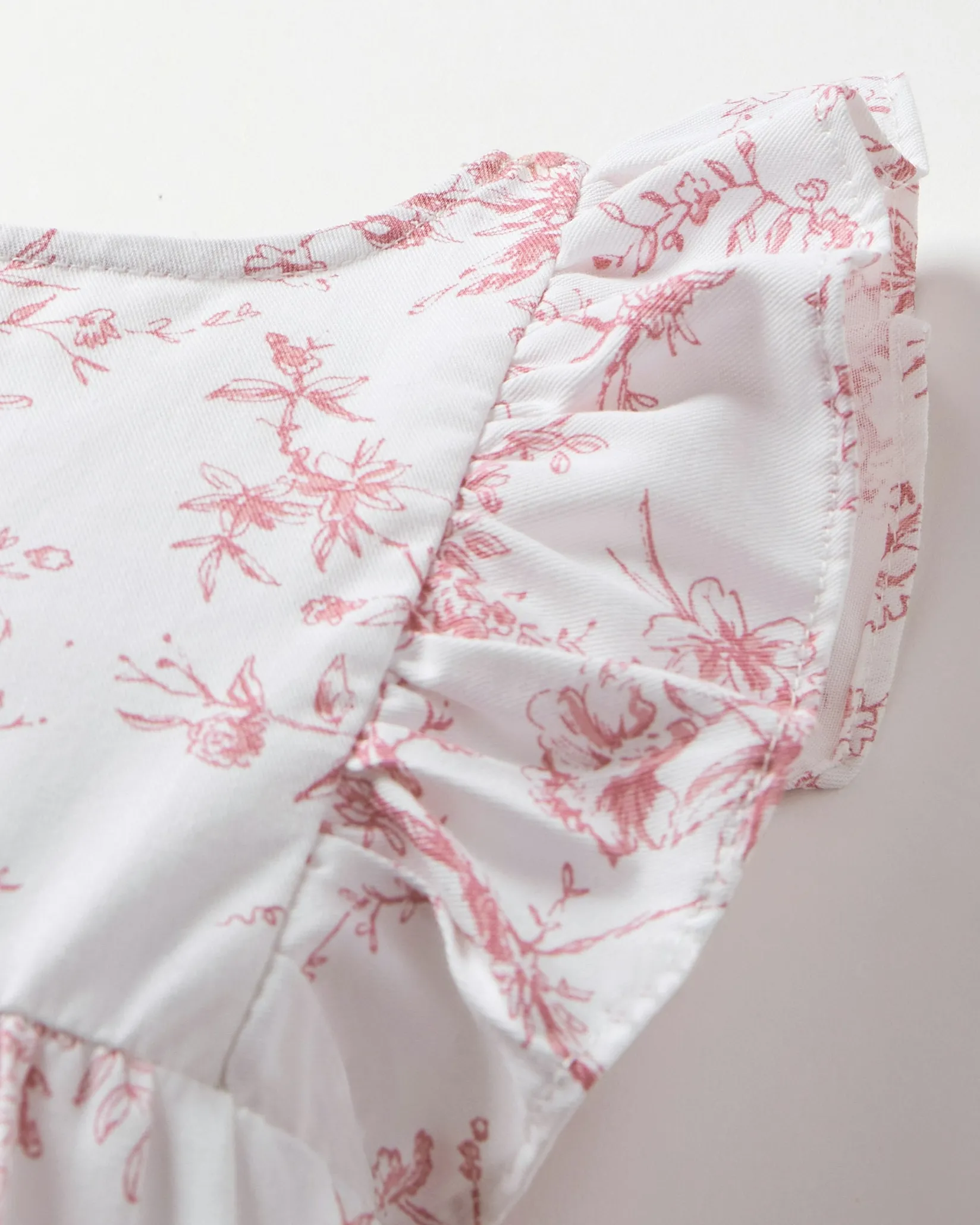 Petite Plume Baby's Twill Ruffled Romper in Pink Timeless Toile
