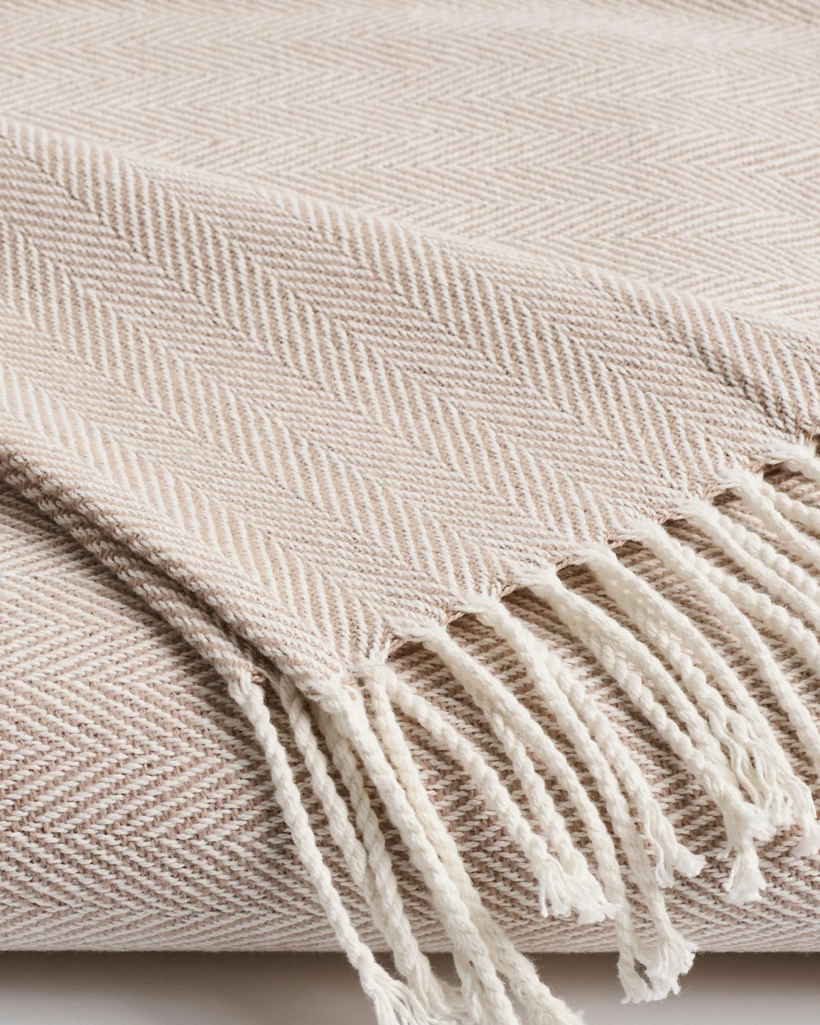 Petite Plume Herringbone Throw in Light Heather Grey