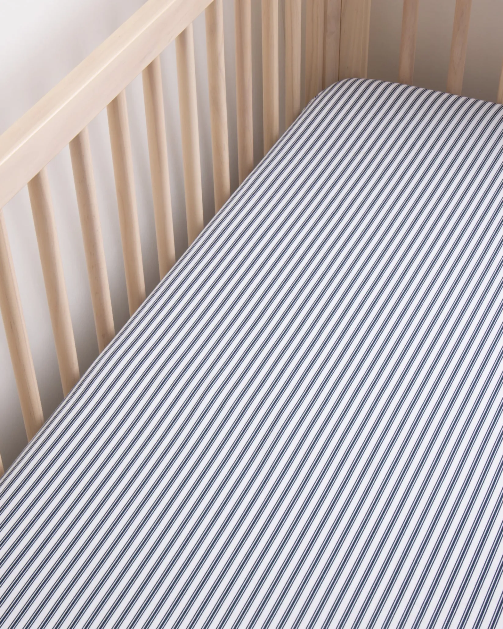 Petite Plume Luxe Premium Cotton Crib Sheet in Navy French Ticking