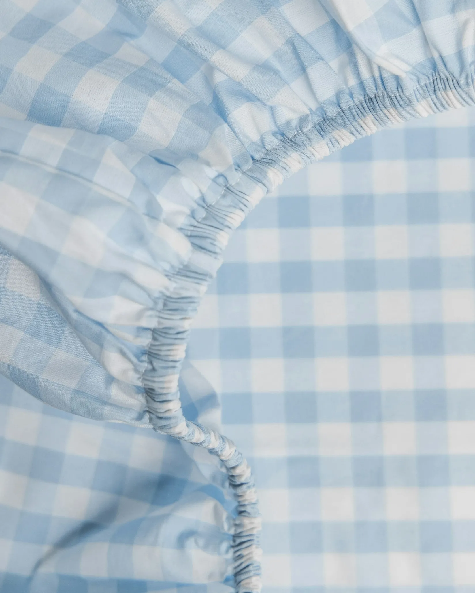Petite Plume Luxe Premium Cotton Crib Sheet in Navy Gingham
